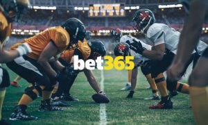 Two Teams On American Football Field In Line of Scrimmage with Bet365 Logo Layered Over