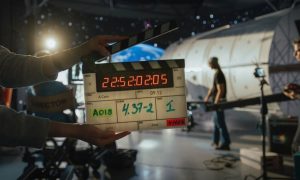 On A Filming Set with the Director's Tape Getting Ready to Cut