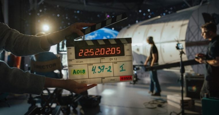 On A Filming Set with the Director's Tape Getting Ready to Cut