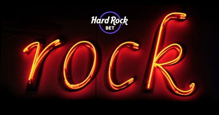Hard Rock Bet Logo with Image of Glowing Neon Sign Reading "rock"