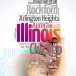 Man's Hand with Marker Points to Illinois Surrounded by Cities