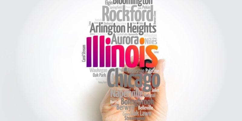 Man's Hand with Marker Points to Illinois Surrounded by Cities