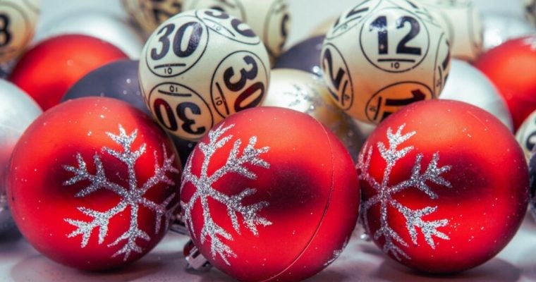 Lottery Balls Sit With Red Christmas Tree Balls