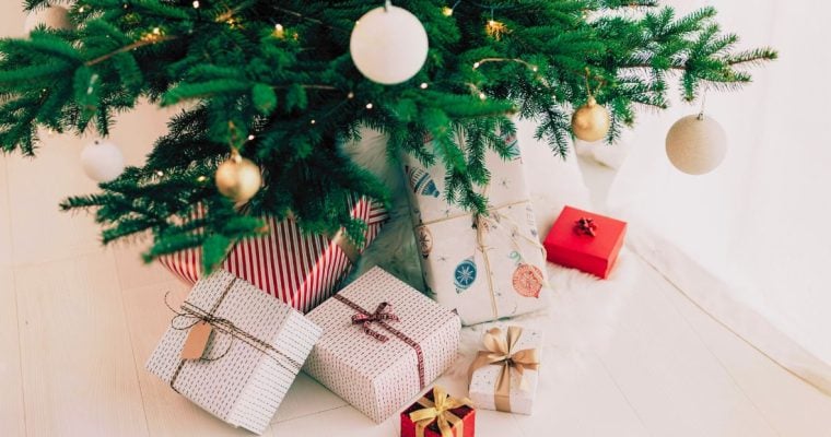 Bottom of Decorated Christmas Tree Displays Wrapped Gifts