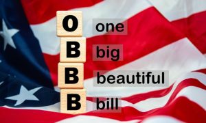 "One Big Beautiful Bill" Over American Flag and Wood Blocks with OBBB Letters