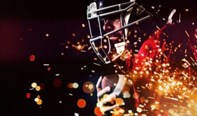 Red & Yellow Fireworks Burst Beneath American Football Player