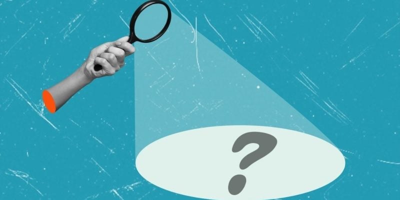 Hand Holds Magnifying Glass With Spotlight Pointing at Question Mark Art Collage