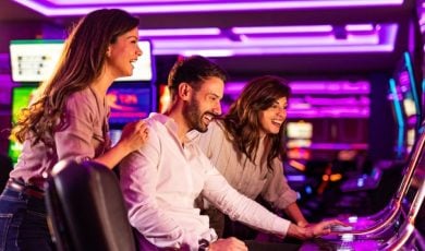 Two companies have partnered to stream online casino content onto slot machines at land-based casinos.