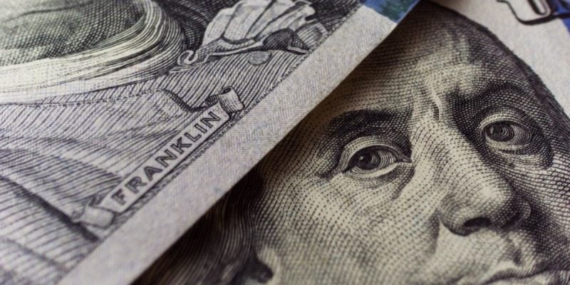 Two US Cash Bills Close Up Featuring President Franklin's Face