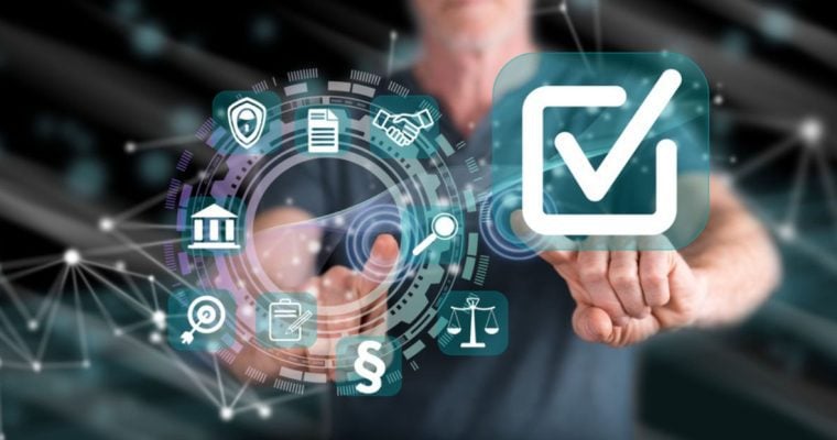 Man Touches Digital Touch Screen with Check Mark Symbolizes Future Proofing