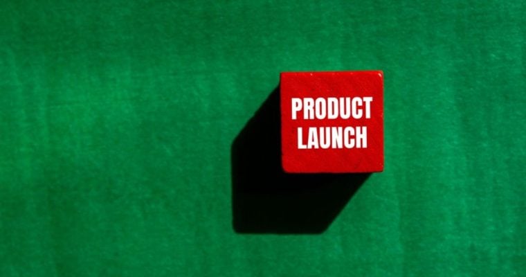 Red Cube Reads "Product Launch" in White Font on Green Background