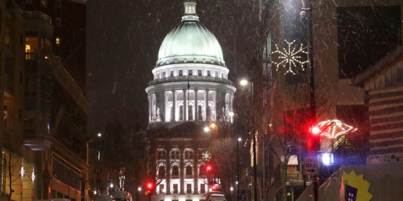 City Street View of Wisconsin State Capitol on Snowy Winter Night