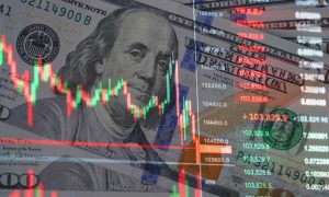 $100 Bills of US Currency with Overlay Image of Financial Graph Fluctuations