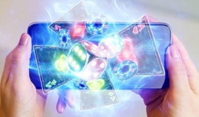 Digital Dice, Playing Cards and Poker Chips Emerge from Cell Phone in a Woman's Hands