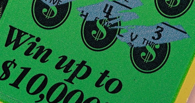 Green and Black Used Scratch Off Lottery Game