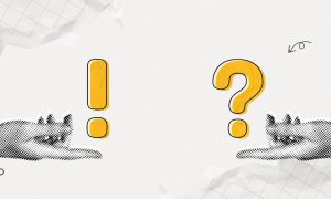 Yellow Exclamation Point and Question Mark Sit Above Pointed Fingers