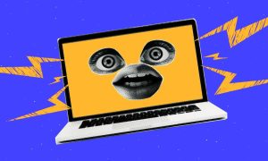 Laptop with Eyes and Mouth Has Surprised Expression On Blue Background