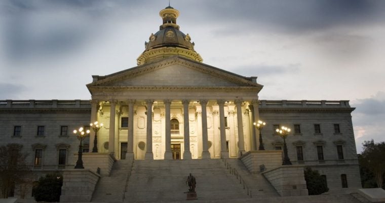Cloudy Skies Above Well Lit South Carolina State House Building