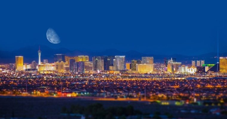 Entire Cityscape of Las Vegas Nevada, with the Moon Over it at Night