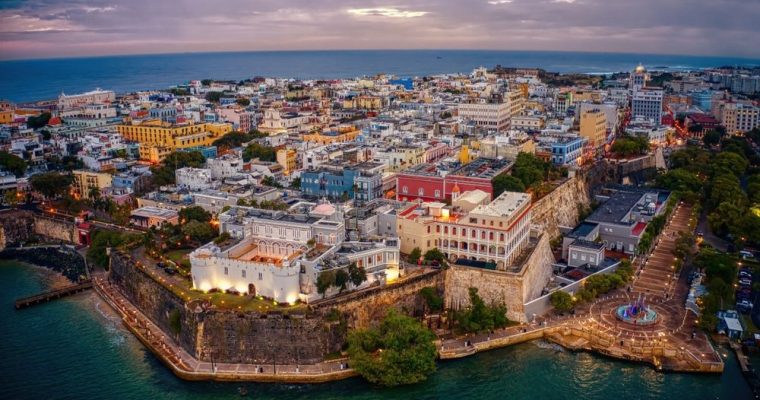 Clouds Hang Over Lit Buildings in Old San Juan, Puerto Rico