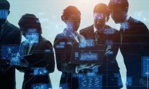 Business Men and Women Work Together Analyzing Data with Digital Screens Overlay