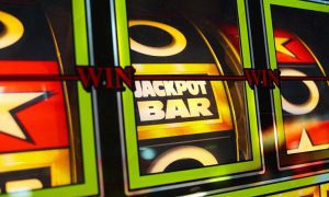 Spinning Slot Reels Reveal Jackpot Bar, Star and Other Symbols