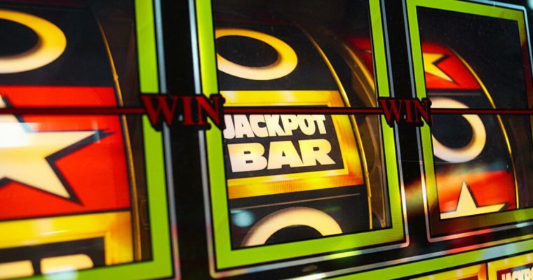 Spinning Slot Reels Reveal Jackpot Bar, Star and Other Symbols