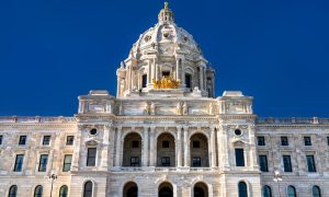 Close Up of the top of Minnesota's State Capitol Building with Blue Sky Behind