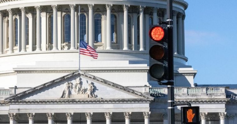 Front of the US State Capitol Building and Street Light at Red