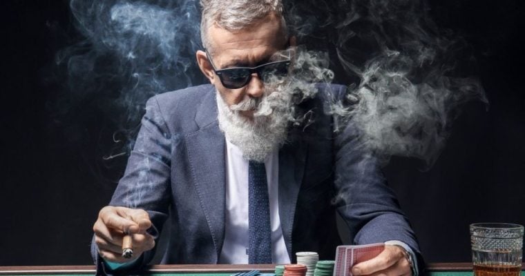 NJ governor urges lawmakers to settle the casino smoking ban question.