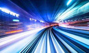 Tunnel Of Blue and White Lights From Fast Moving Train Car