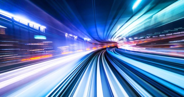 Tunnel Of Blue and White Lights From Fast Moving Train Car