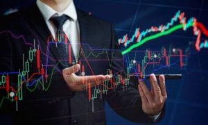 Colorful Financial Line Graphs Displayed Across Image of Man In A Suit Holding Smartphone