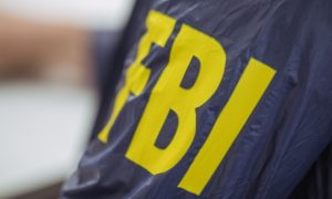 FBI cracks down on suspected illegal sports betting operation.