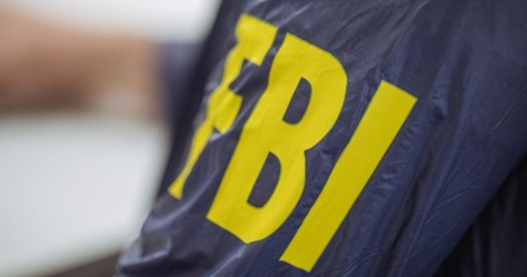 FBI cracks down on suspected illegal sports betting operation.