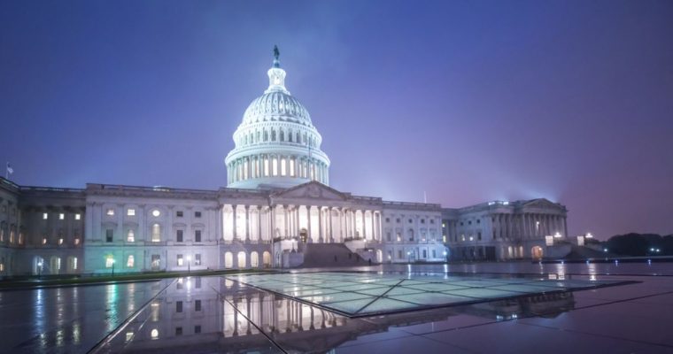 White Lights Shine Bright Inside the US State Capitol Building During Evening Hours