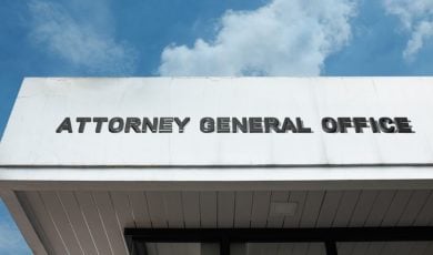 Building Facade Reads Attorney General Office in Dark Grey Letters
