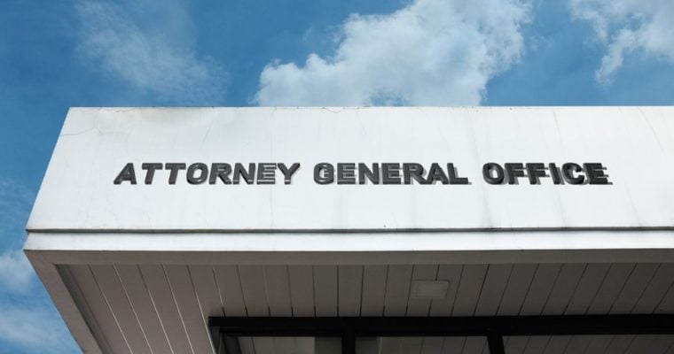 Building Facade Reads Attorney General Office in Dark Grey Letters