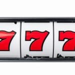 Old School Silver Slot Reel Reads 777 in Red