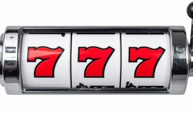 Old School Silver Slot Reel Reads 777 in Red
