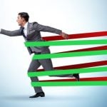 Red and Green Bands Hold Running Man In Gray Suit