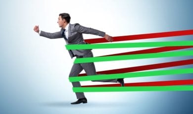 Red and Green Bands Hold Running Man In Gray Suit