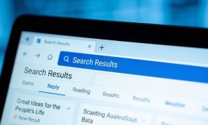 Computer Monitor Shows Online Search Results