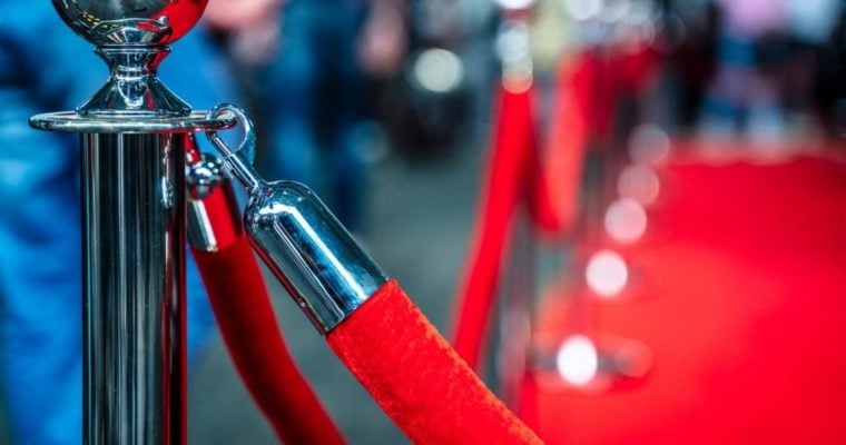Red Velvet Rope Surrounds a Red Carpet