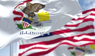 Close Up of Illinois State Flag Waving In front Of American Flag
