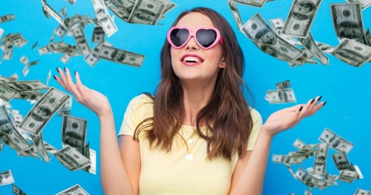 Falling Cash On Blue Background Surrounds Young Happy Woman