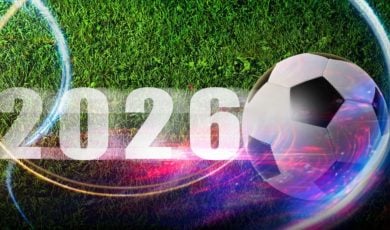Text Reads 2026 Next to Soccer Ball on Green Grass