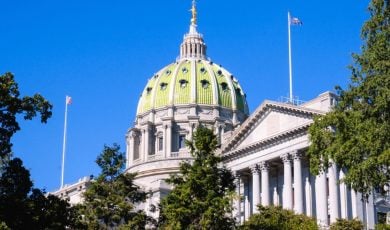 Green Trees and Blue Sky Surround the Capitol Building in Pennsylvania