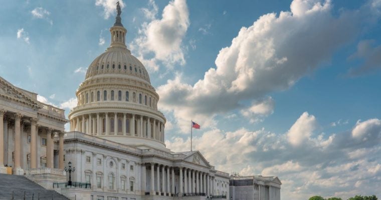 Blue, Cloudy Sky Behind the White Capitol Building in the US