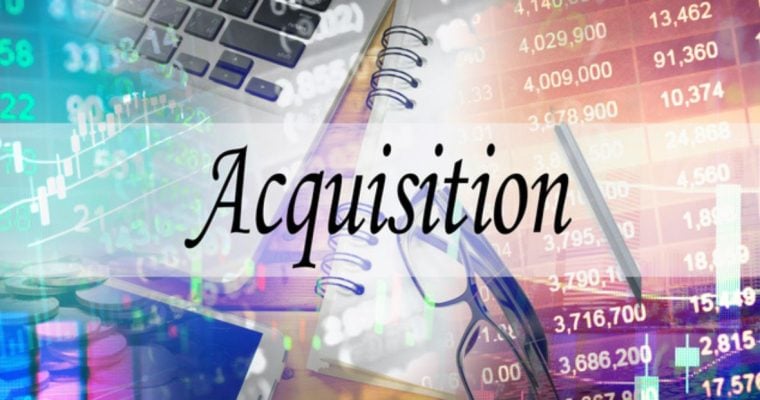 Stock Numbers, Notebook, Glasses and Laptop Background to the Word Acquisition in Black Font